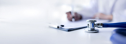 Clipboard and stethoscope on the desk